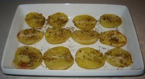Halve bagte kartofler med oregano